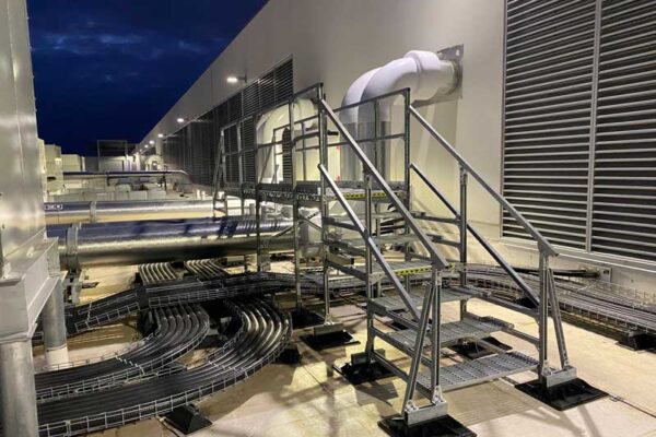 Rooftop crossover stairs on data center roof